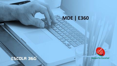 Mão em cima do teclado e o símbolo da plataforma de registo E360